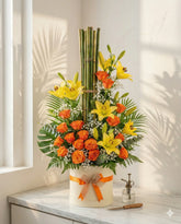 Vibrant Orange Roses and Yellow Lilies Flower Box